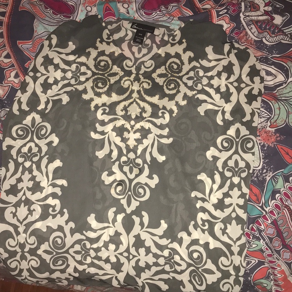 Sleeveless dressy design shirt gently used  14/16